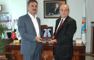 Denizbank'tan Refik Yılmaz'a Plaket